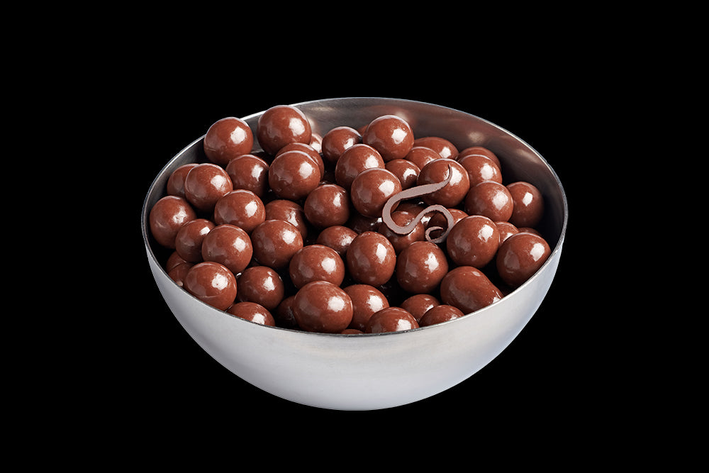 Noisettes enrobées de chocolat au lait